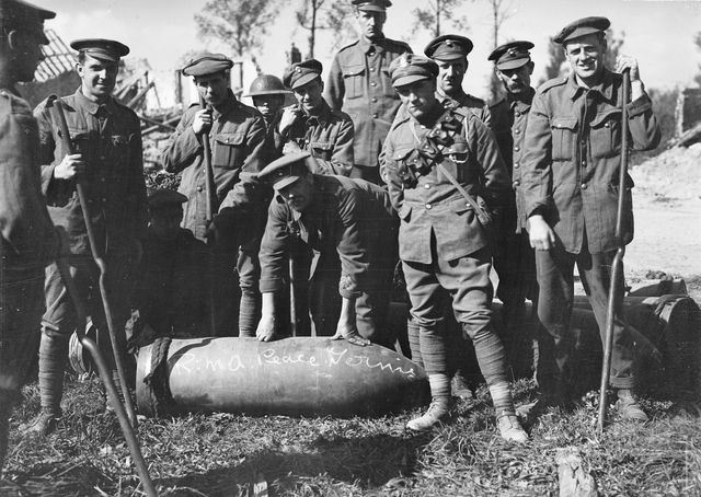 The crew of a Royal Marine Artillery 15-inch howitzer supporting the Australians. The shell is chalked 'RMA Peace Germies'. The RMA had been raised in 1804.