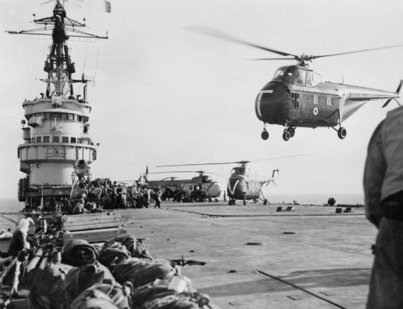 Whirlwind helicopters take the first men of 45 Commando from HMS Theseus to Port Said in Operation Musketeer. It was the first time a helicopter assault was used operationally to land troops in an amphibious attack.