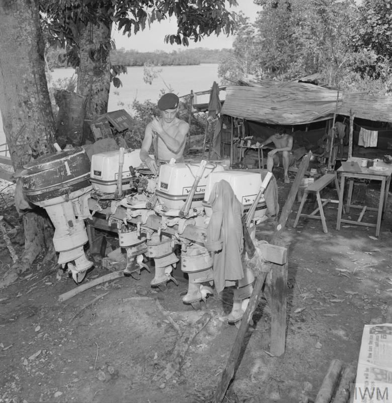 Marine A. Sharpe services outboard motors for 40 Commando's assault craft in Sabah, during the Indonesia–Malaysia confrontation.